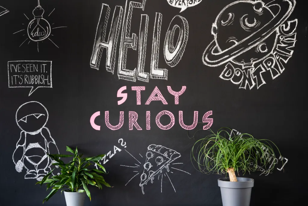 Stay-curious wall art as a symbol for TypeScript utility types